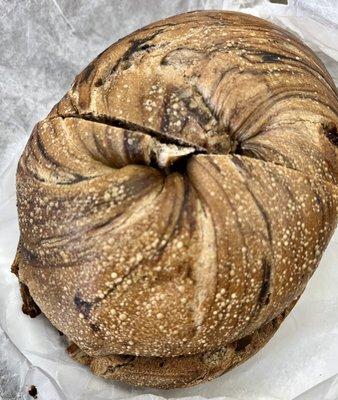 cinnamon raisin bagel toasted with cranberry walnut spread