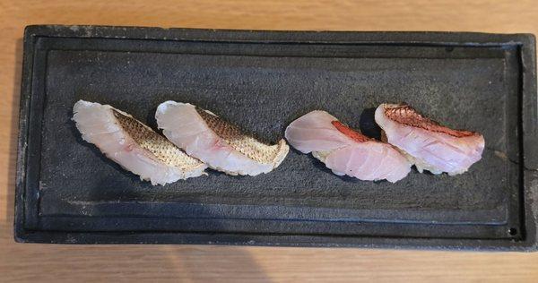 From right to left: Golden Eye Snapper,  Barracuda