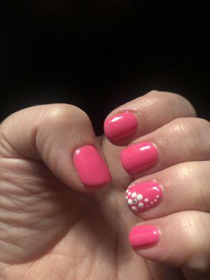 Shellac manicure with design and jewel.