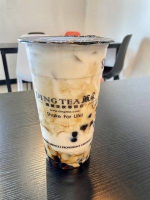 Winter melon milk tea with boba, egg pudding, and grass jelly.