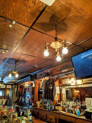 Behind the bar and light fixtures