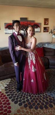 Red ball gown with gold appliqué. Beautiful dress!