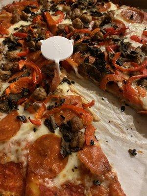 four topping sausage, pepperoni, red pepper, mushroom