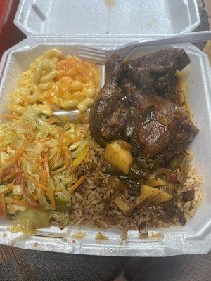 Brown Stew Chicken. Rice and beans. Cabbage. Mac & Cheese.