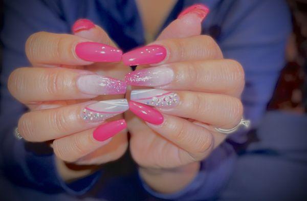 Pink acrylic nails with designs