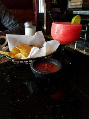 Strawberry margarita with chips and salsa