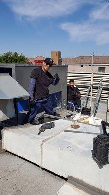 Installation of new Rheem 15 ton rooftop package unit by our cheerful crew.