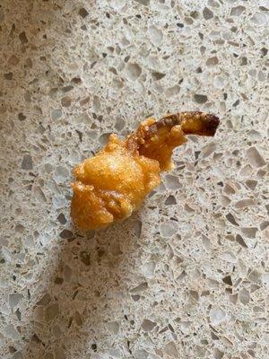 Cheese curd with a side of onion ring.