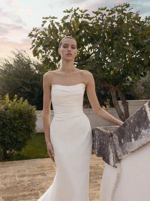 Fit and Flare, strapless, modern wedding gown.