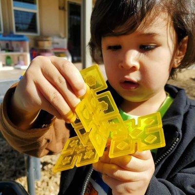 Fine motor skills and imagination meet when children construct with a variety of open-ended materials.