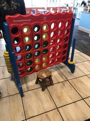 Nice play area for the kids reminds me of connect four game. There's even a stool for the little ones.