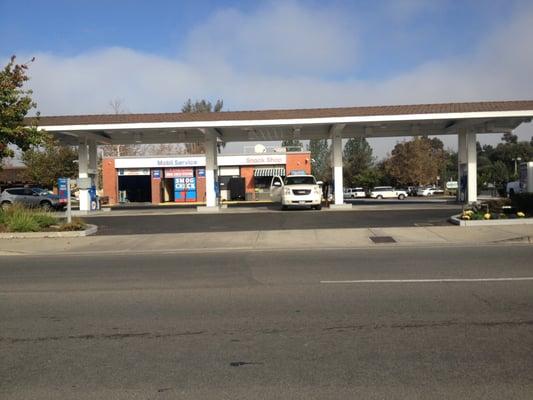 on the corner of Poway and Midland, next to sprouts, inside Mobile Gas Station