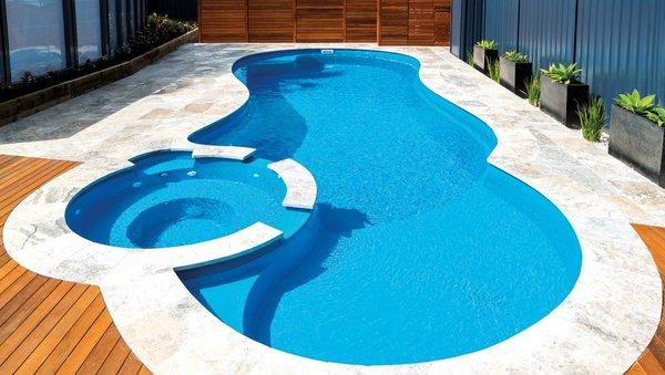 A swimming pool does more than add value to your house, it also provides your family with a place to relax and exercise...