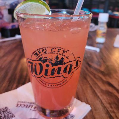 Strawberry peach margarita on the rocks