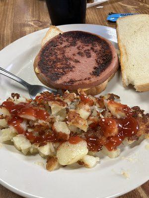 Fried Bologna sandwich and hash browns.