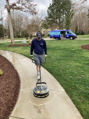 Surface cleaning a sidewalk...