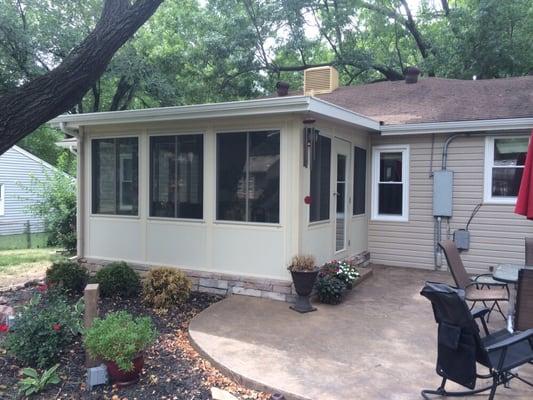 All seasons sunroom, stamped concrete, lifetime siding, replacement windows, roofing.