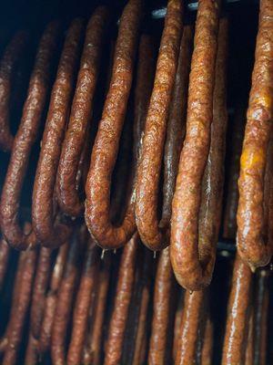 Fresh kielbasa in the smoker makes for a wonderful day.