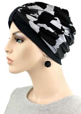 Two-tone fashion turban in the black base and black-grey floral pattern.