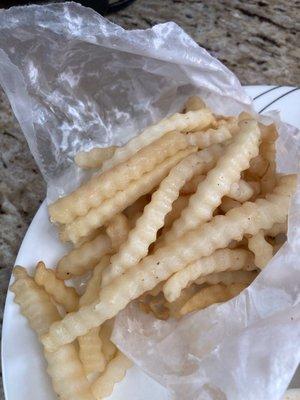 Raw, cold, wet fries.  We should have checked before we left with our to go order. Two orders of fries inedible.