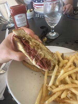 Reuben sandwich $15 w fries, $2 up charge for truffle Parmesan but worth it