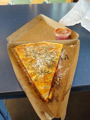 Stuffed meat lovers slice of pizza for $5.65+tax.  It comes with pepperoni, sausage, and ham.