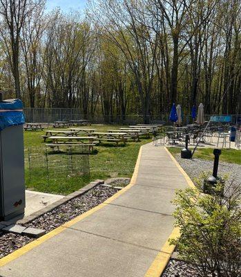 Places for drunks to sit and get more drunk, while they're playing volleyball, drunk.