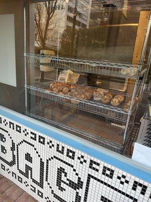 Storefront window with bagels