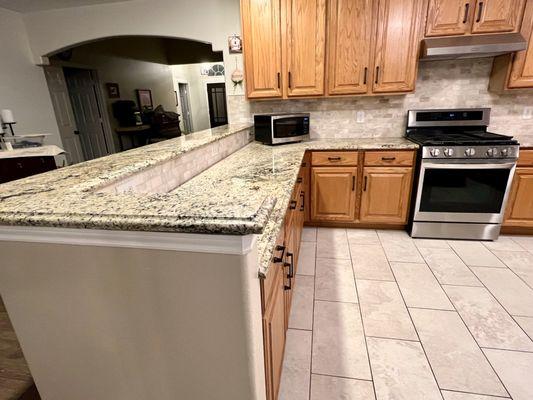 Finished granite countertops and backsplash