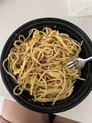 Carbonara pasta that looks like I put together at home. Hell, I could've done a better job!