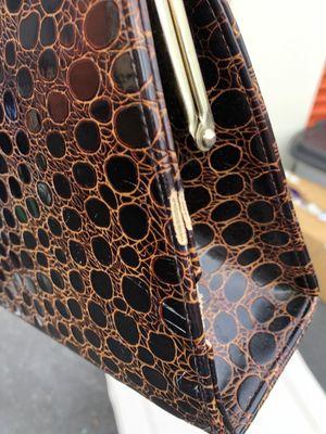 Rat damage to alligator purse