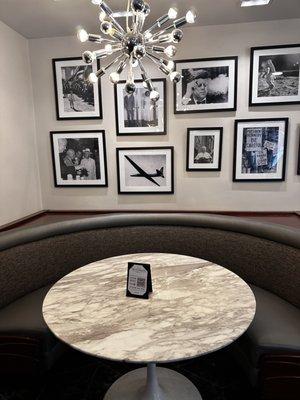 cute table with JFK pics behind