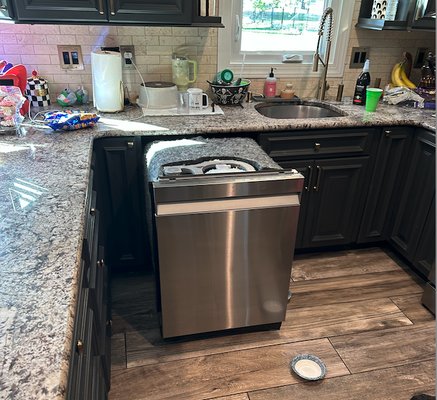 Broken down fishwasher sitting in middle of my kitchen