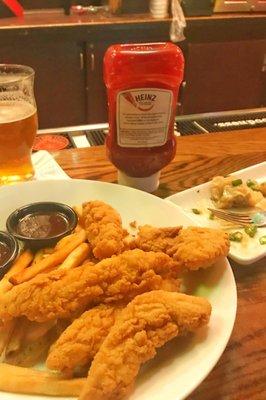 Chicken Tenders with fries and the Pot Stickers