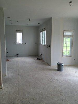 Drywalling, taping, mudding, priming walls and ceilings