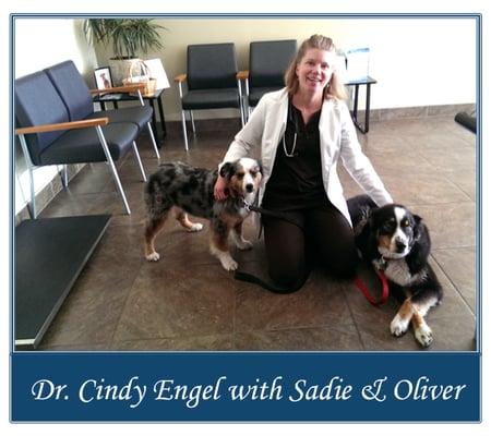 Dr. Cindy Engel with two happy customers: Sadie & Oliver!