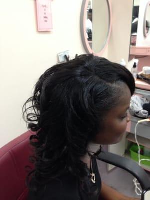 Full sew in weave.