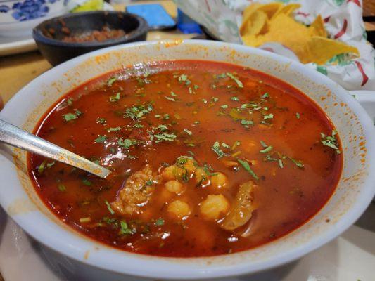 Menudo is always a winner! Not spicy with more of a red sauce flavor.