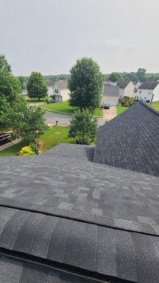 View from Above showing Completion with 30 year warranty from Owens Corning manufacturing company.