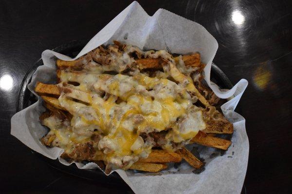 Loaded fries topped with steak and melted cheeses