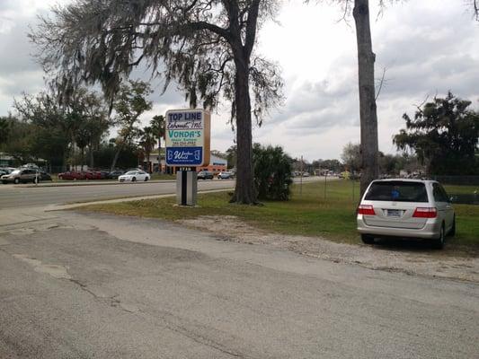 Here's the street sign you will see announcing Vonda's Salon along Nova Road.