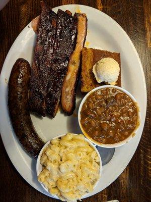 Two meat (pork ribs & bratwurst) w/mac n' cheese, bbq baked beans, & cornbread