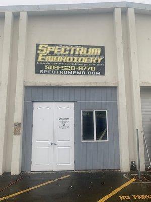 Spectrum Embroidery is located in the Garage Sale Warehouse Building, Suite 2 (across from the Michael's Craft Store.)