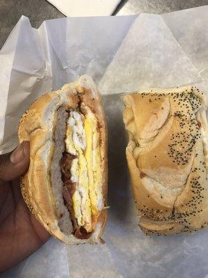 Hungry Man-Sausage, Bacon, Egg and Cheese on a Roll ($6.70)