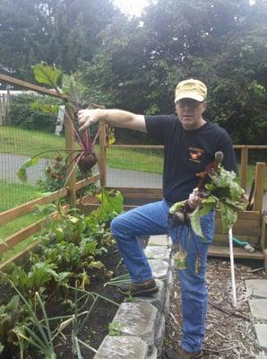 I may be in a suit Monday through Friday, but I get my hands dirty every chance I get.  I love to garden.