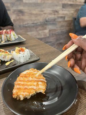 There is my cute gel X orange nail set at cherry blossom sushi house looking super cute in the background.