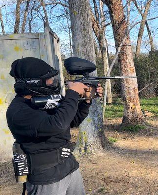 Practice shooting in the back wood field