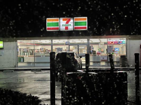 Store front at night and in the rain