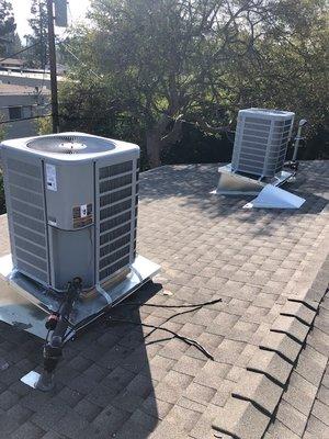 Two condensing units awaiting to finalize refrigerant charge test