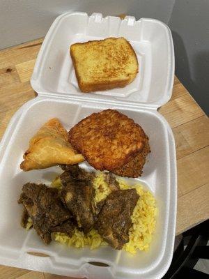 Breakfast platter: rice, lamb stew, hash brown, falafel, French toast, and sambusa